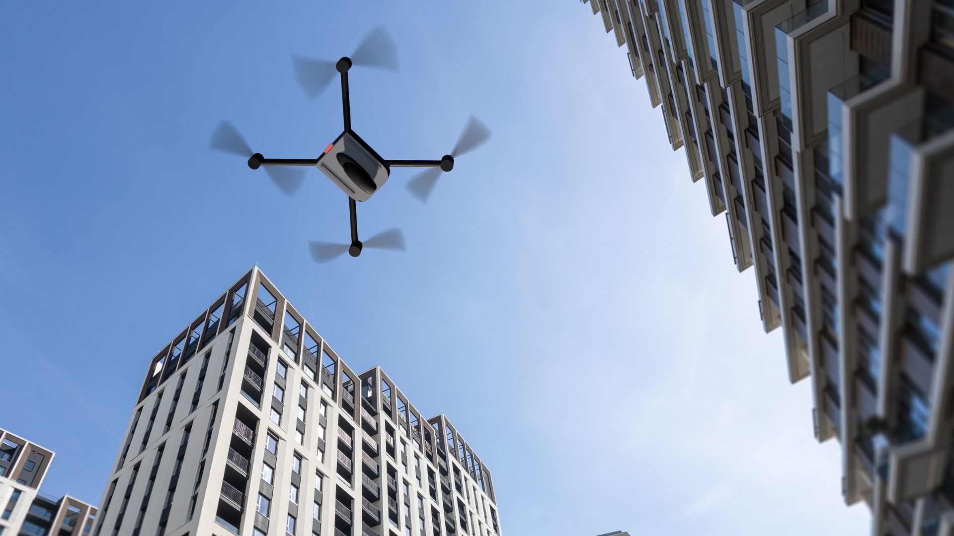Drone flying between buildings